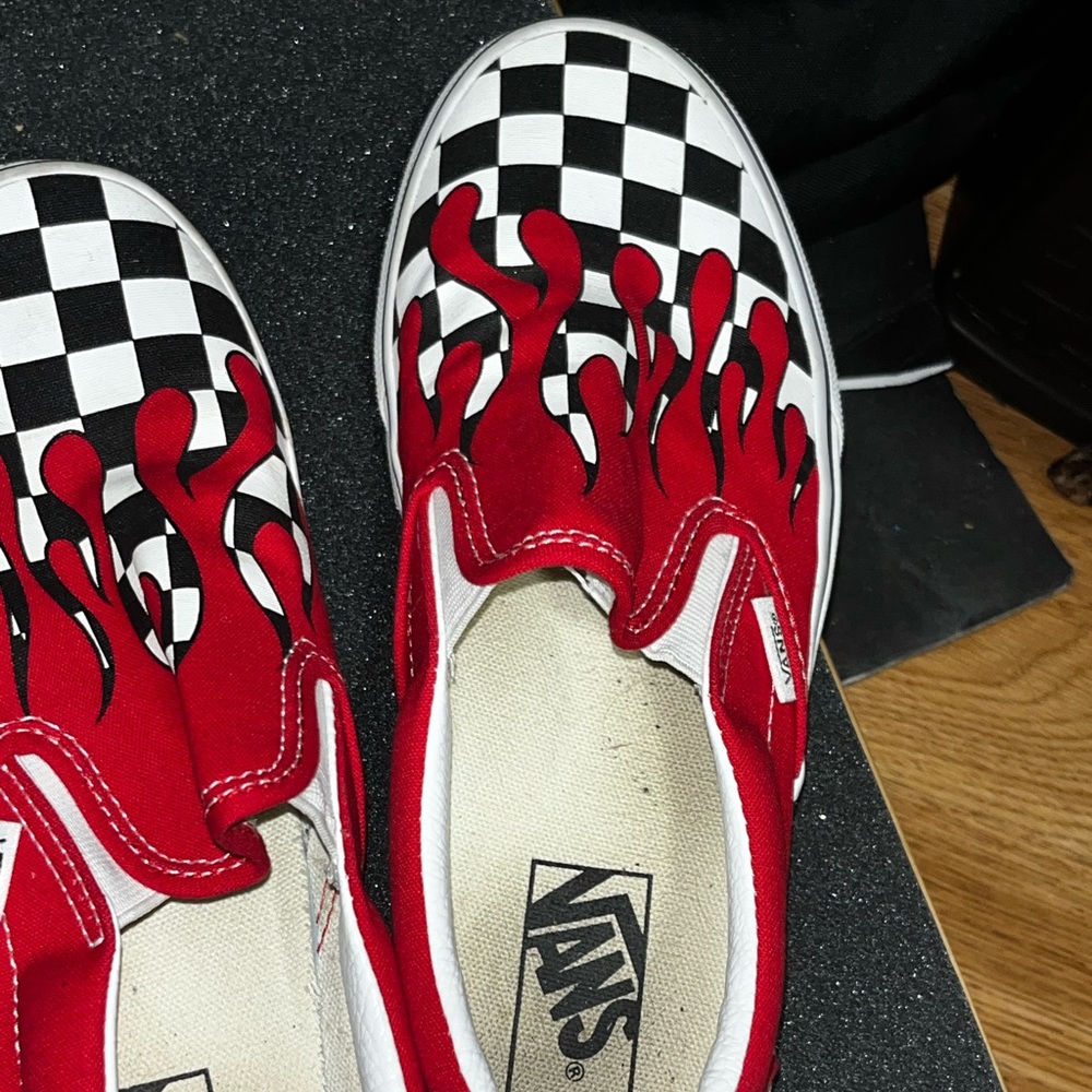 A pair of slip on vans
